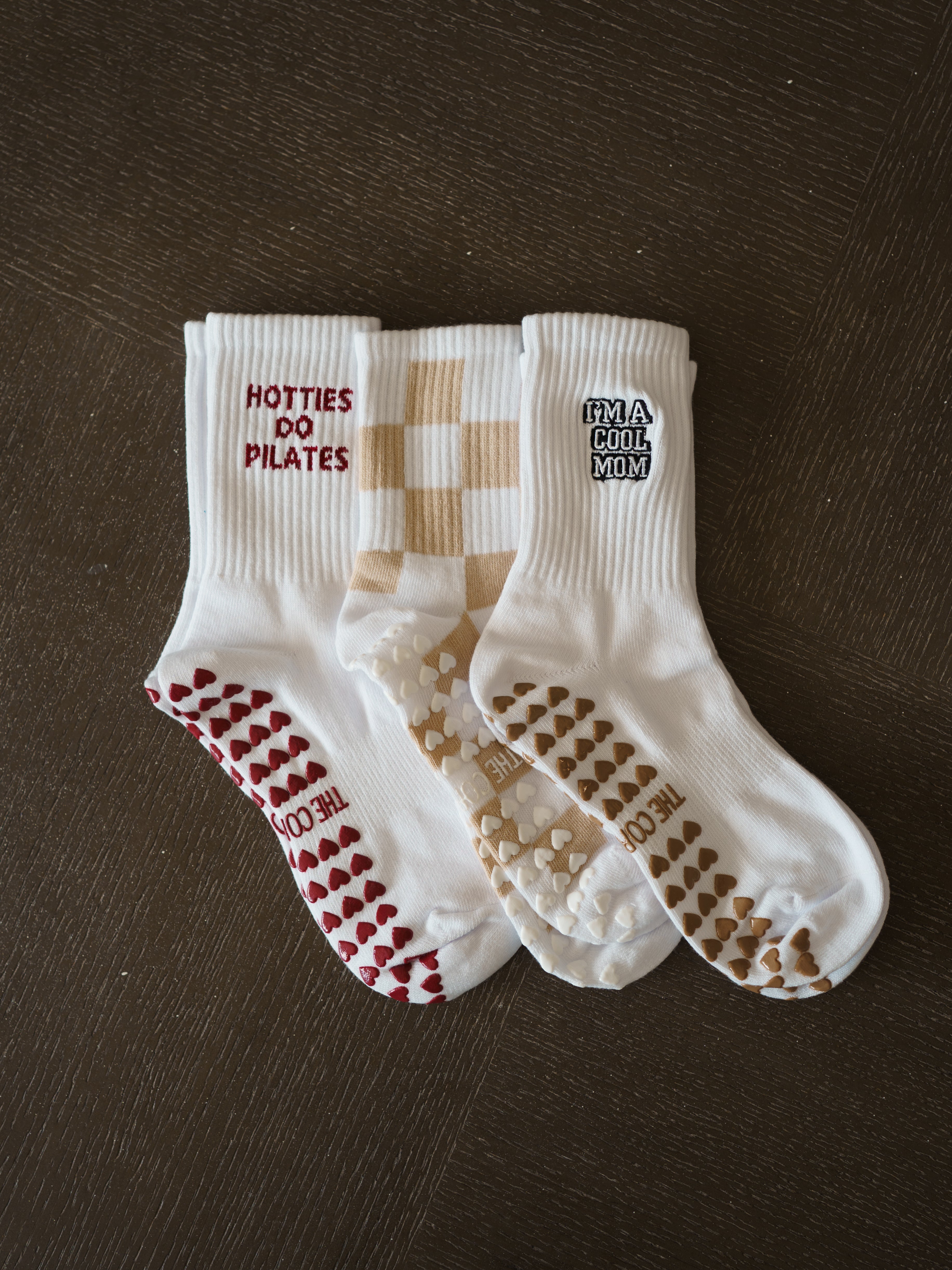 core club hotties do pilates, white and sand checkered socks, im not a regular mom, im a cool mom, pilates grip socks, neutral pilates outfits